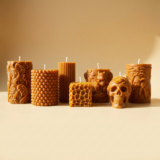 Group photo of The Angelina Store Nag Champa Pillar Candle Collection – handcrafted caramel-colored pillar candles featuring intricate designs including Elephant, Waves, Bubble, Squirrel, and Skull, all infused with rich Nag Champa fragrance.